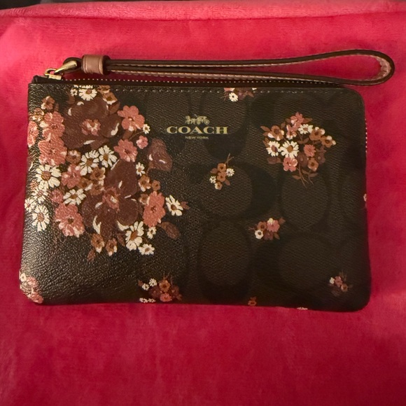 Coach Handbags - COACH Brown Floral Signature Wristlet with Gold Logo
